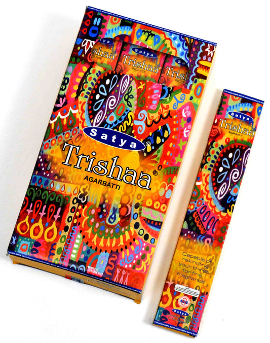Colorful Satya- Trishaa Nag Champa incense pack, made by the Genuine Nag Champa Company, perfect for aromatic experiences.