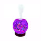 Purple EssentialLitez essential oil diffuser with psychedelic mushrooms design, 120 ml, color-changing LED lights.