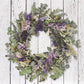 Lively Pasadena Wreath made of baby eucalyptus and dried flowers, perfect for adding elegance to any space.