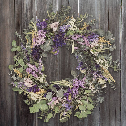 Beautify your home with the Pasadena Wreath, featuring natural eucalyptus and delicate dried flowers.