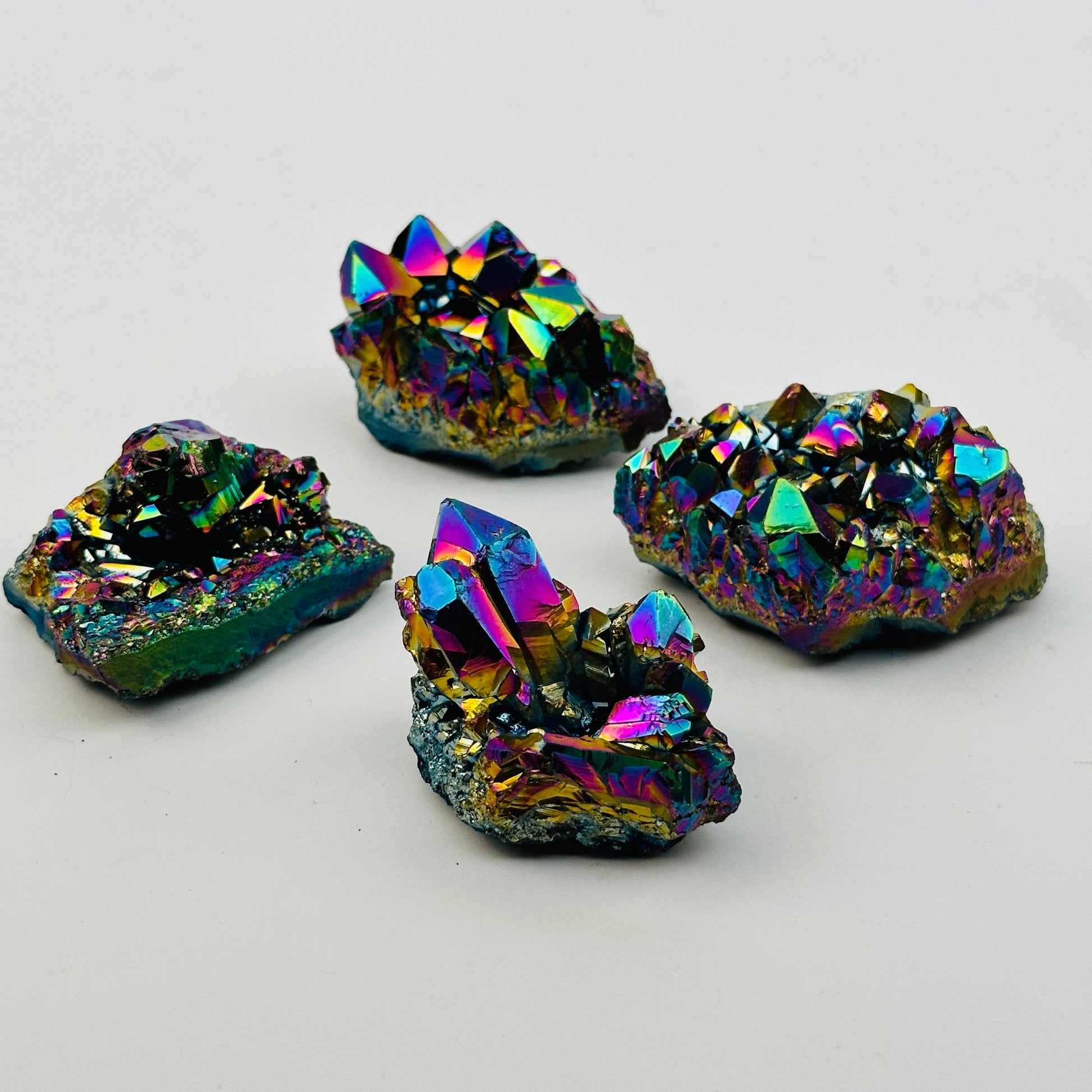 Vibrant Amethyst Rainbow Titanium Crystal set showcasing stunning colors and natural elegance, perfect for crystal enthusiasts.