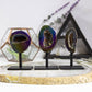 Vibrant Rainbow Titanium Aura Geode Crystal on Stand, perfect for enhancing positive energy and decor.