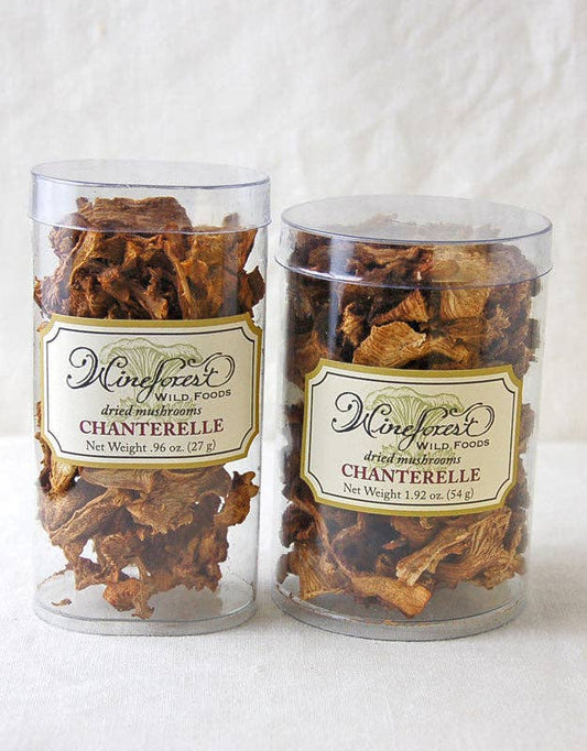 Dried Chanterelle Mushrooms in clear containers, showcasing their rich, earthy flavor from Oregon's lush forests.