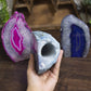 Showcasing the vibrant Agate Geode Cut Base Crystal Lamp, perfect for illuminating your space with color and beauty.