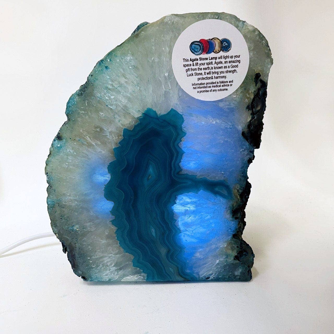 Illuminate your space with the stunning Agate Geode Cut Base Crystal Lamp, featuring vibrant dyed agate colors.