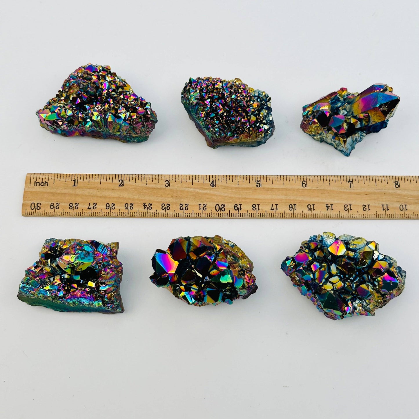 Vibrant Amethyst Rainbow Titanium Crystals showcasing stunning colors, perfect for natural elegance and metaphysical properties.