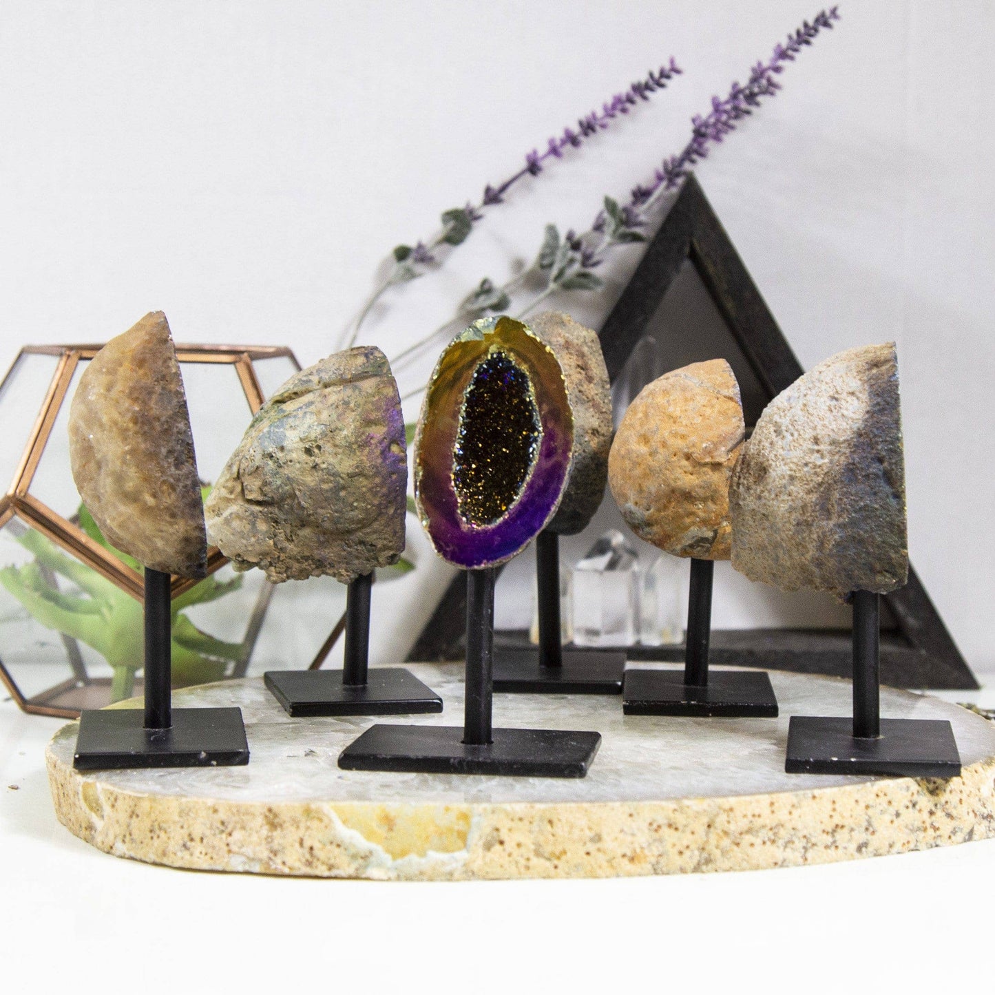 Rainbow Titanium Aura Geode Crystal on Stand, showcasing vibrant hues, perfect for energy and balance display.