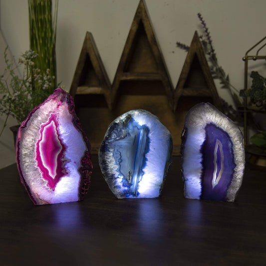 Illuminate your space with the vibrant Agate Geode Cut Base Crystal Lamp in stunning colors. Perfect for any decor!