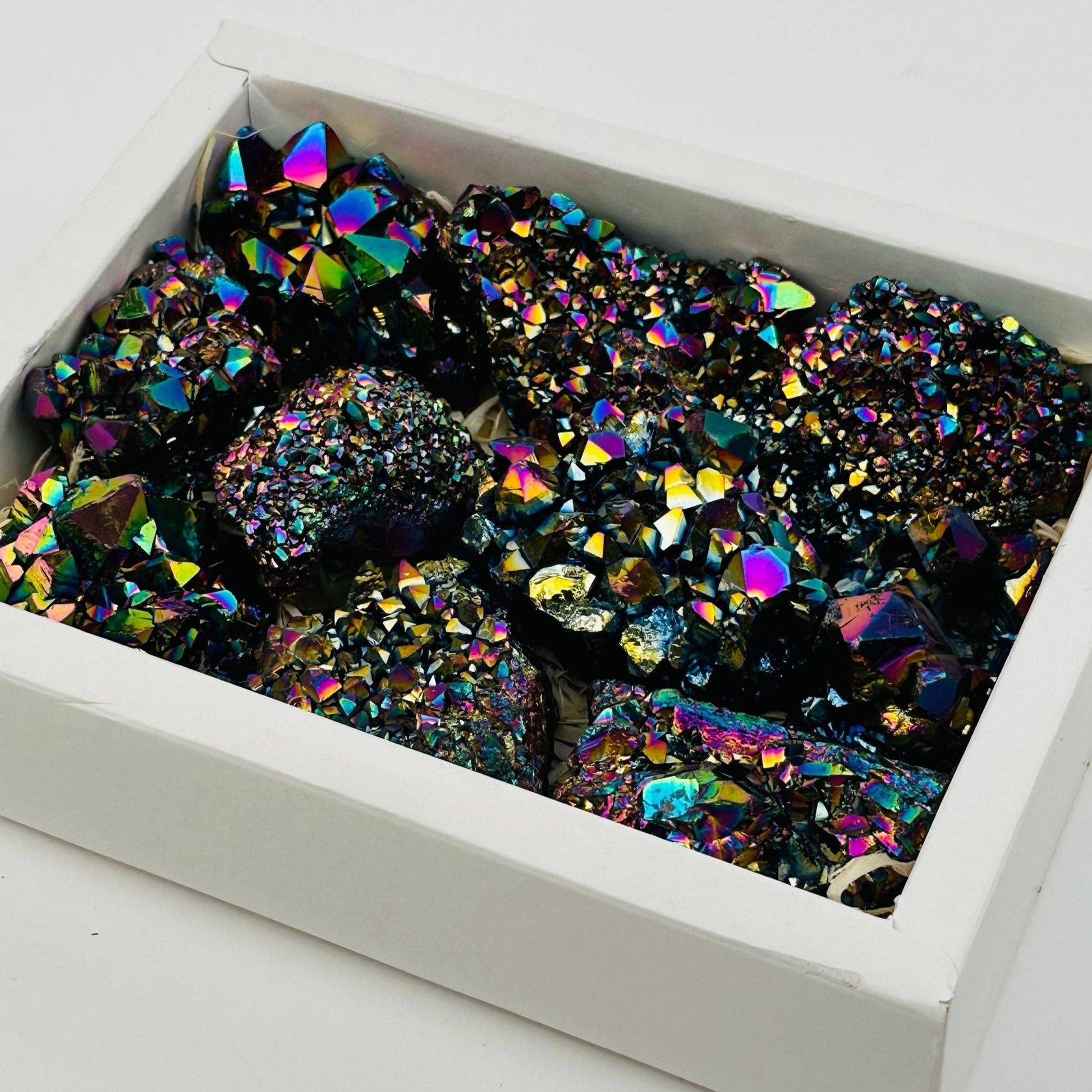 Stunning Amethyst Rainbow Titanium Crystal box set showcasing vibrant colors and natural elegance for crystal lovers.